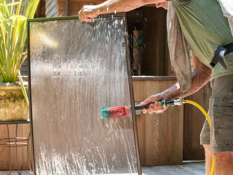 Window screen cleaning by Wizards Window Washing